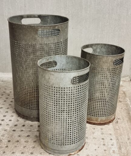 Vintage set of perforated metal waste bins